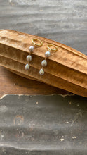 Load image into Gallery viewer, 14KGF Huggie Hoop Earrings featuring 3 Silver Hanging Pearls
